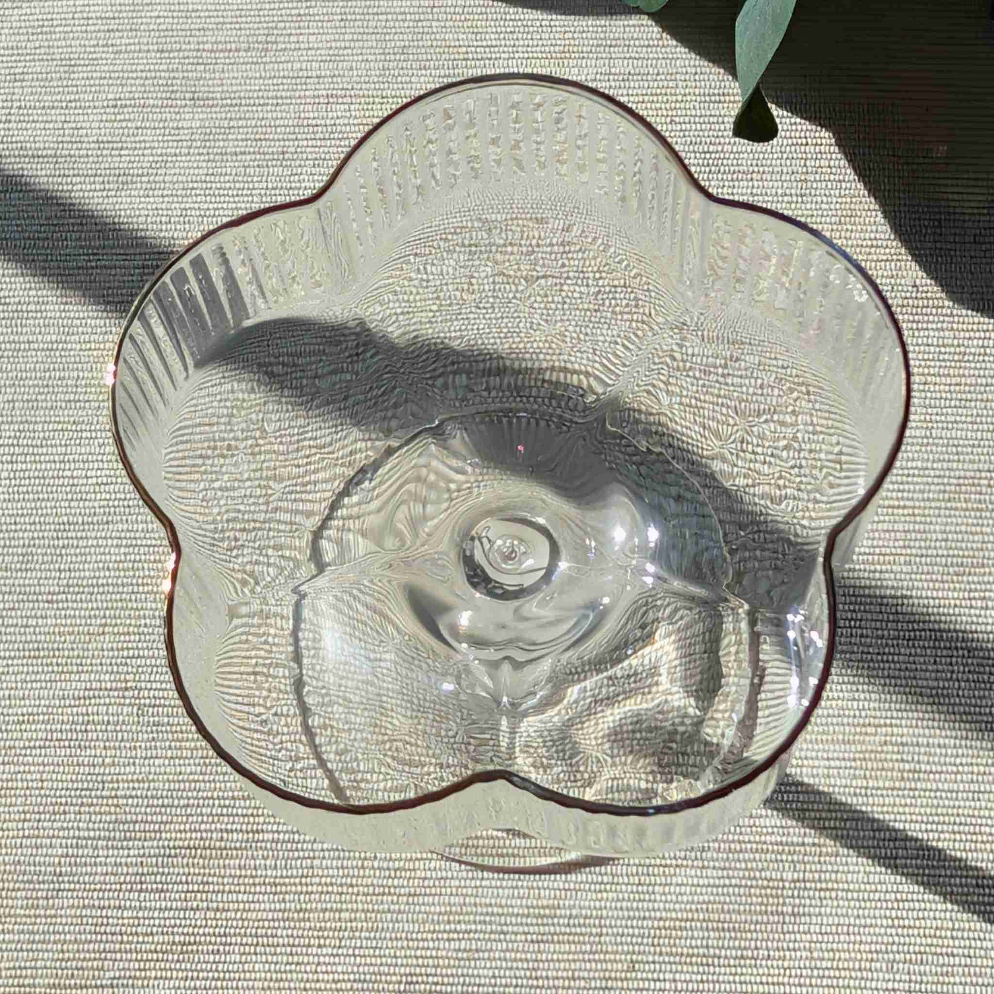 Flower-shaped glass coupe with ribbed design and gold rim, elegant stemmed glassware for cocktails, desserts, or special occasions