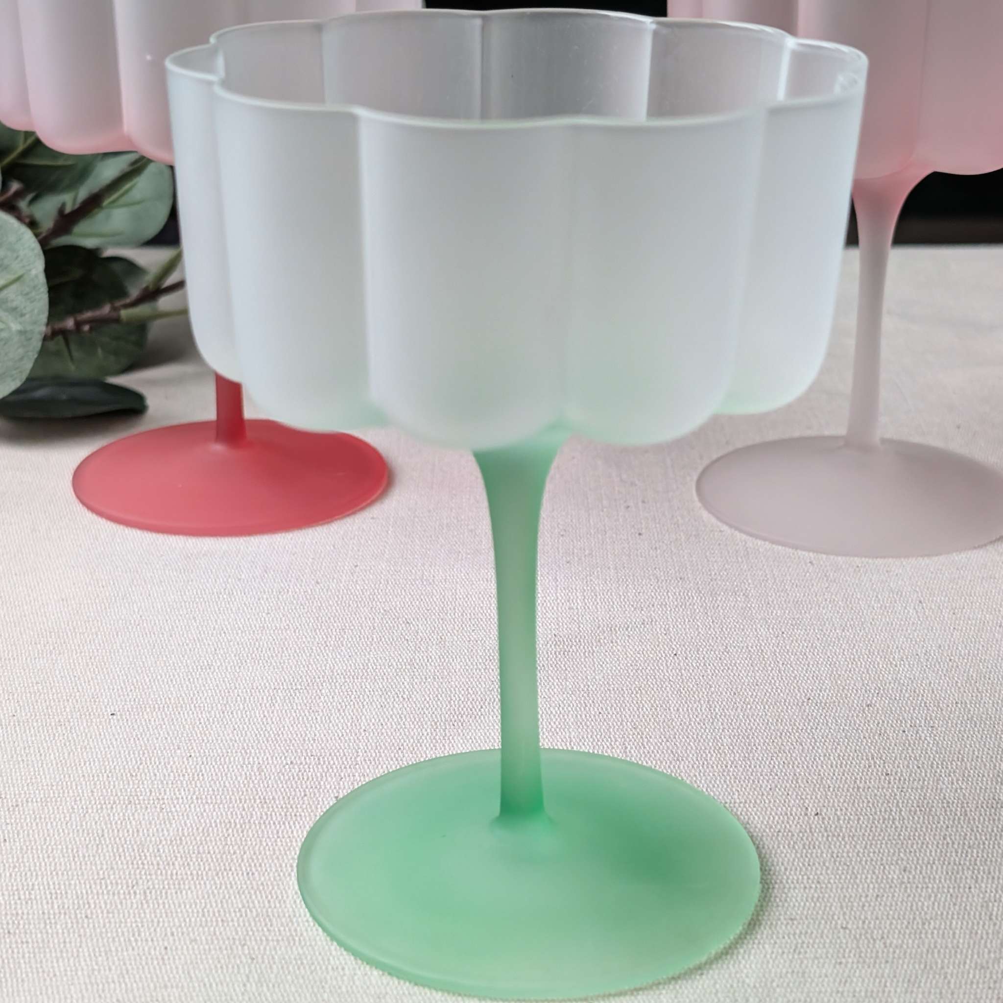 Green pastel flower-shaped scalloped glass, perfect for cocktails, wine, or desserts