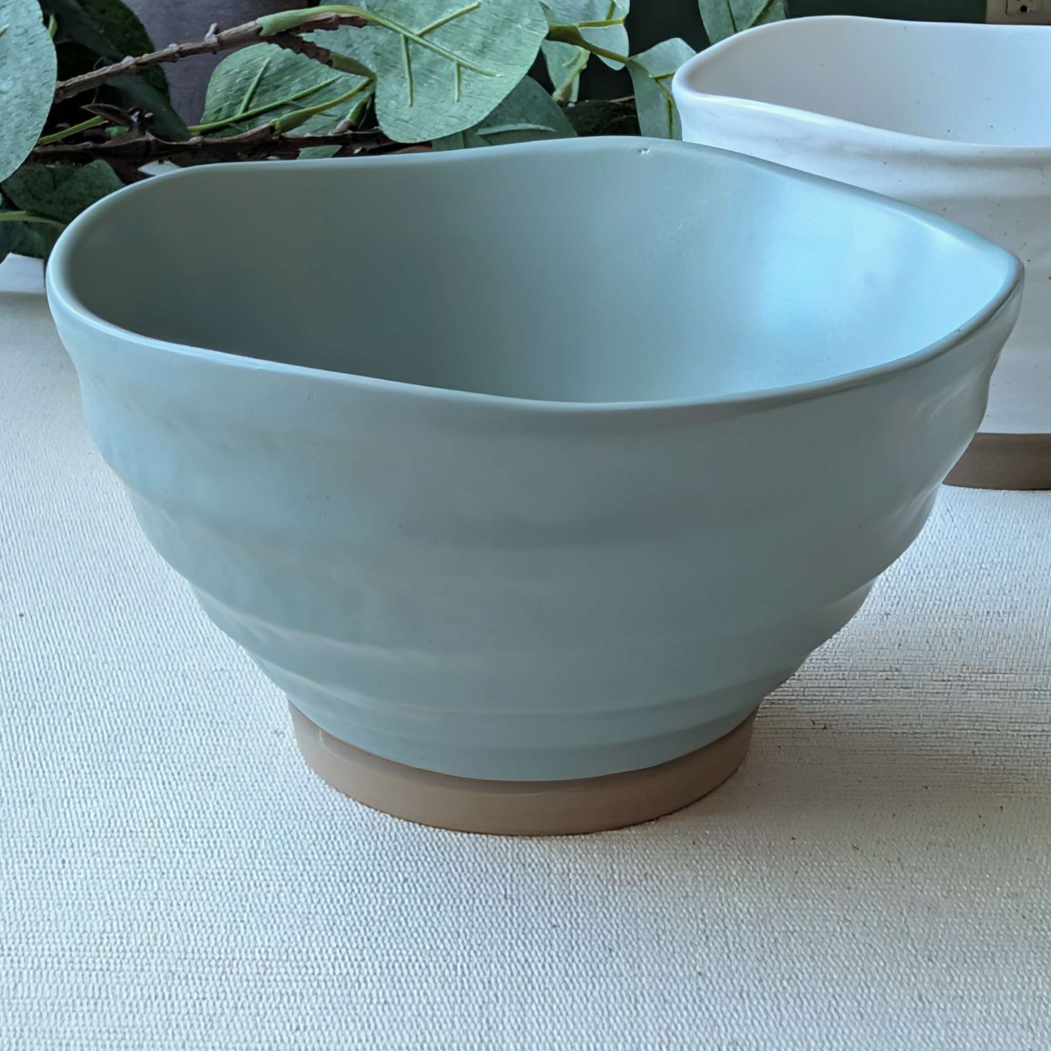 Mint wavy speckled ceramic bowl with natural clay base