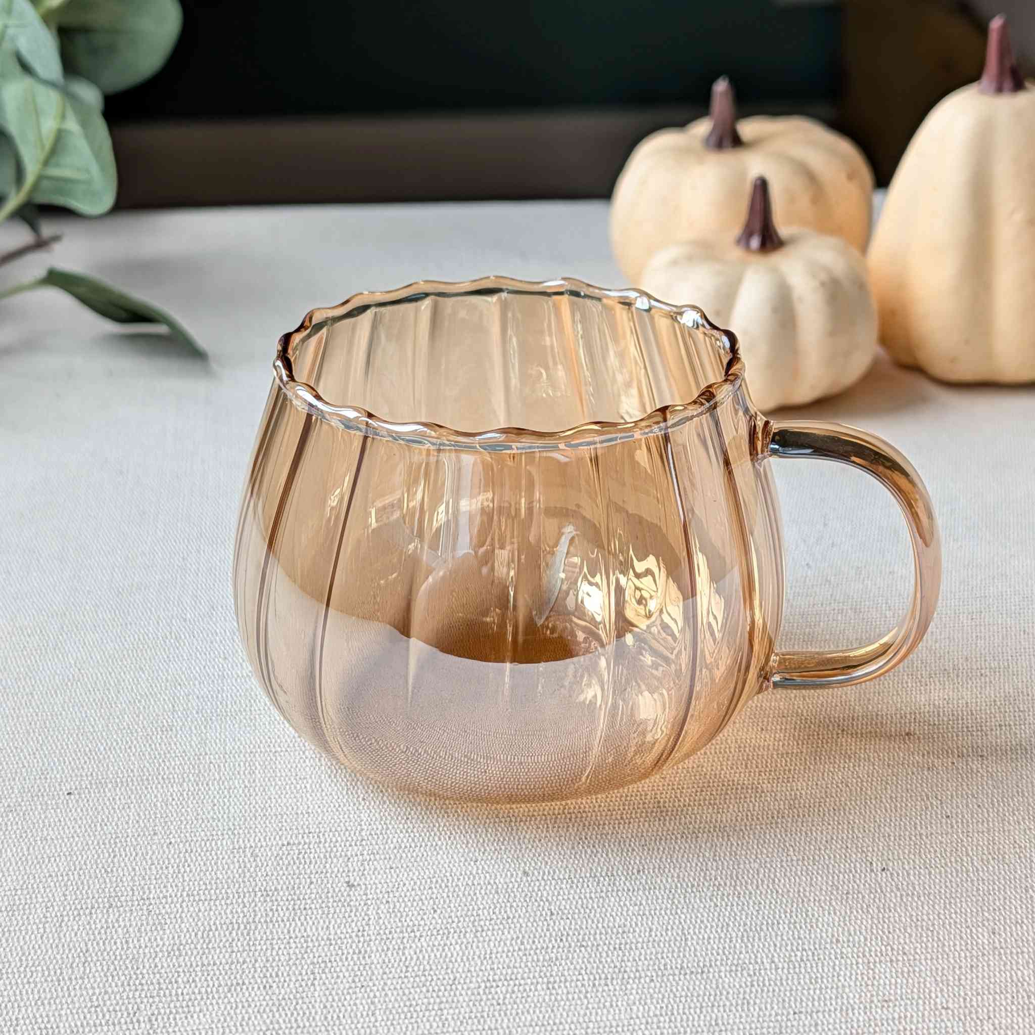 Lightweight amber pumpkin-shaped glass mug